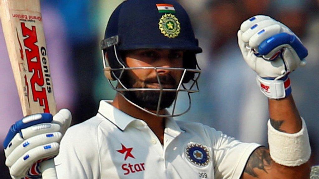 India captain Virat Kohli celebrates reaching his hundred