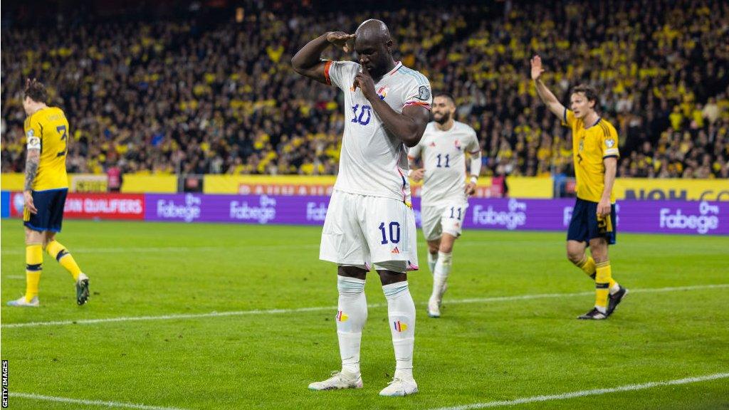 Romelu Lukaku celebrates scoring his first for Belgium