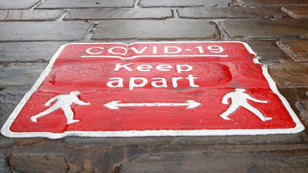 Keep Apart stamp on pavement