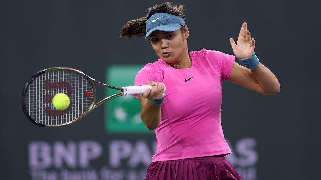 Emma Raducanu hits a forehand against Iga Swiatek at Indian Wells