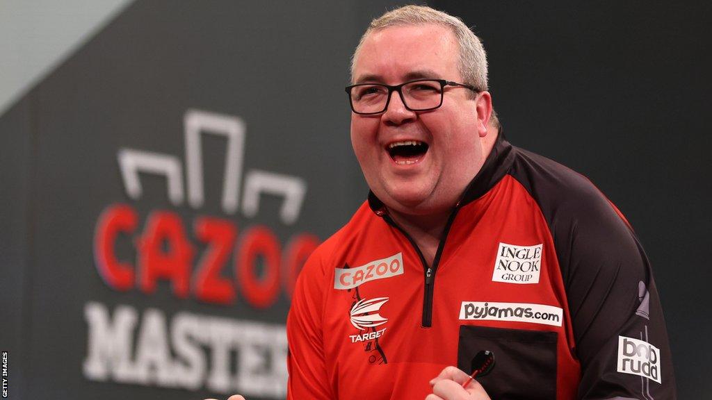 Stephen Bunting celebrates winning the 2024 PDC Cazoo Masters Darts Final at Marshall Arena in Milton Keynes