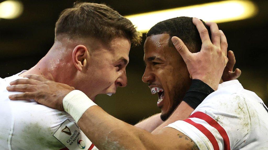 England's Anthony Watson celebrates scoring their first try with teammate Freddie Steward