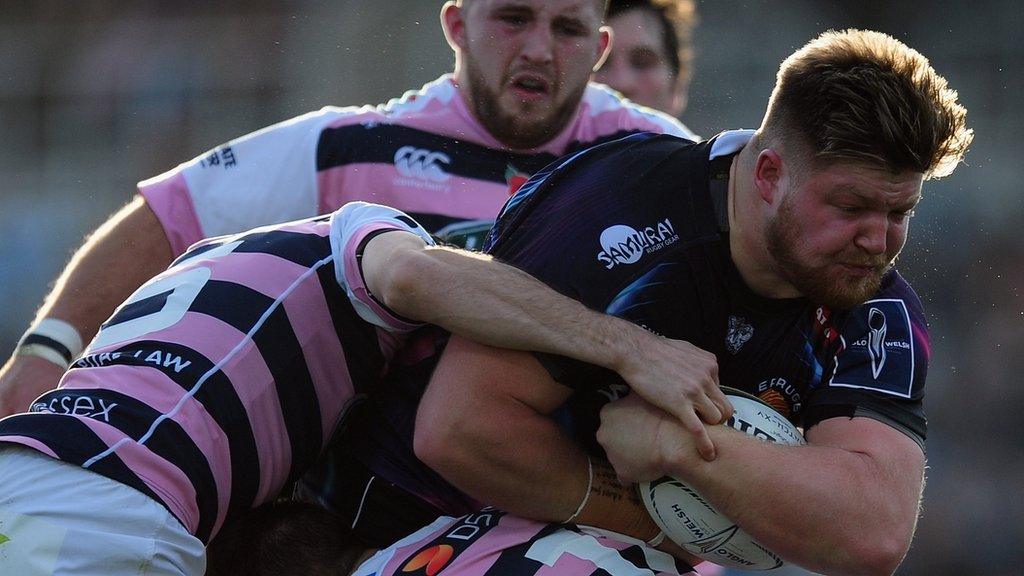 Jack Owlett of Exeter Chiefs is tackled by Cardiff Blues' James Beal