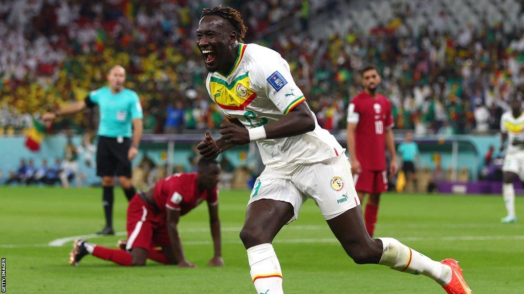 Famara Diedhiou celebrates scoring for Senegal against Qatar at the 2023 World Cup