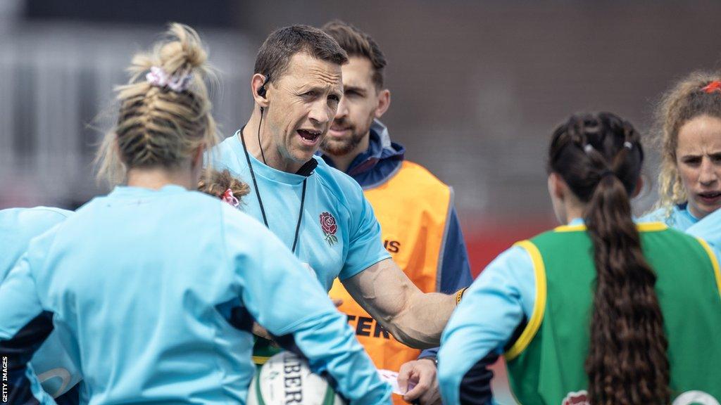 Bemand speaks to England players before a Six Nations match