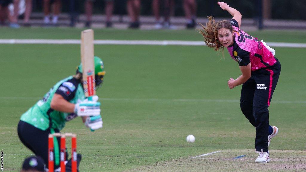 Bowler Lauren Cheatle in action for the Sydney Sixers