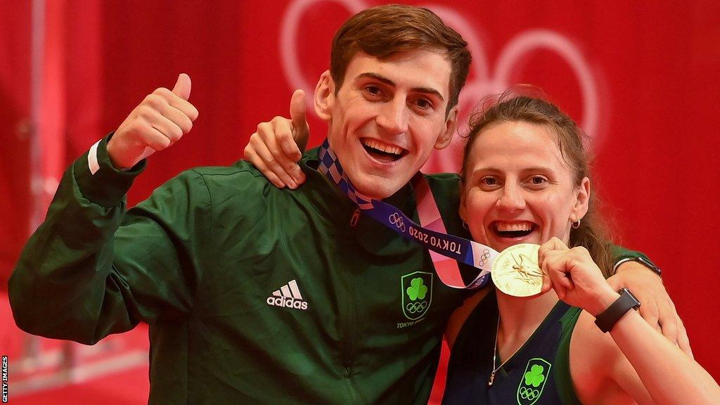 Aidan Walsh celebrates winning a bronze medal at the Tokyo Games with his sister Michaela