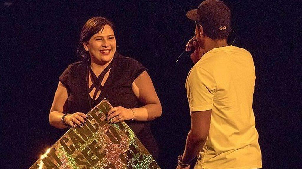 Jay Z and fan on stage