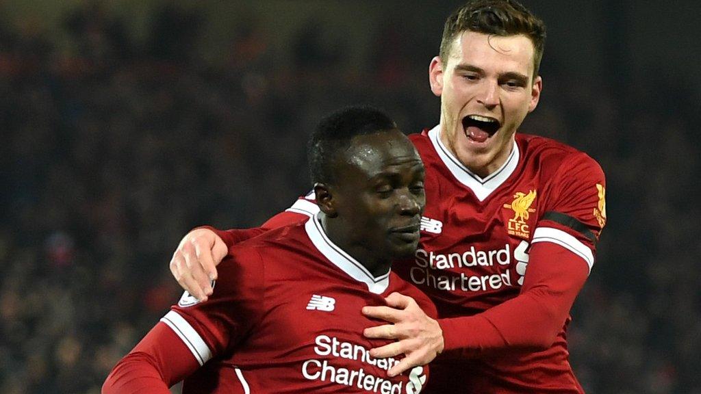 Mane and Robertson celebrate