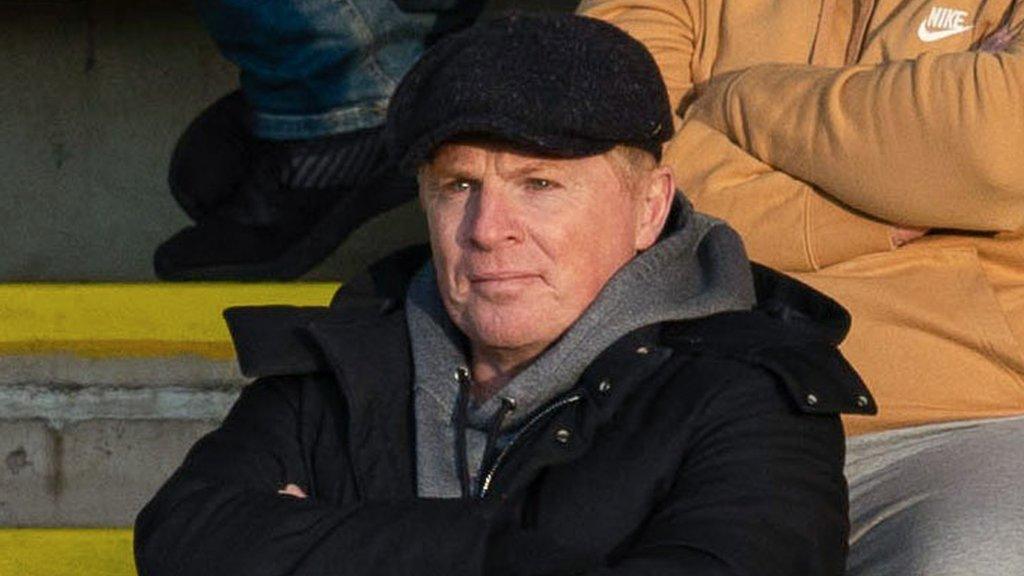 Neil Lennon in the stand at a match