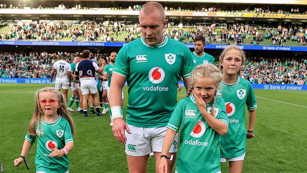 Keith Earls with his three daughters on the pitch at the Aviva Stadium