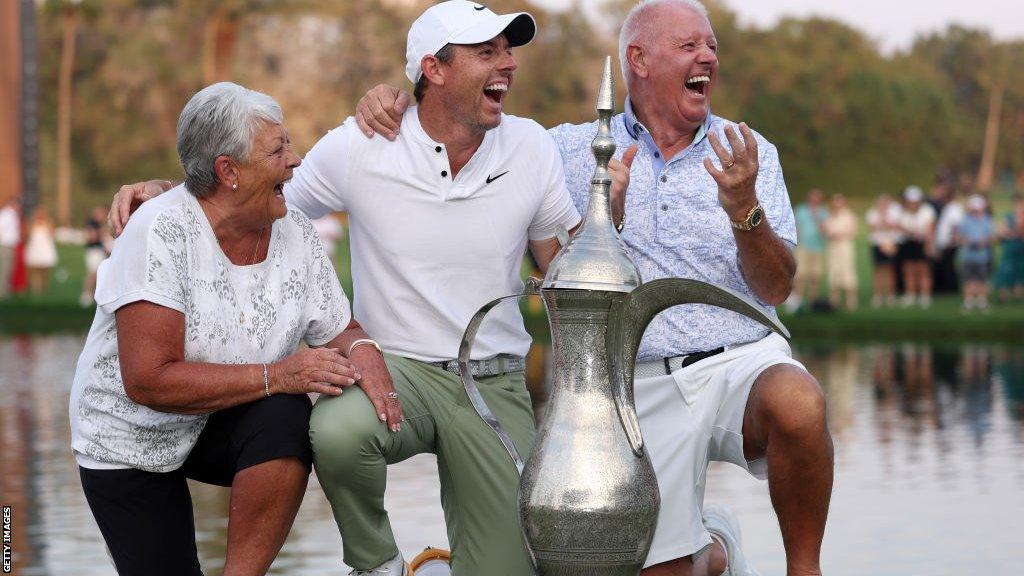 (l-r) Rosie, Rory and Gerry McIlroy