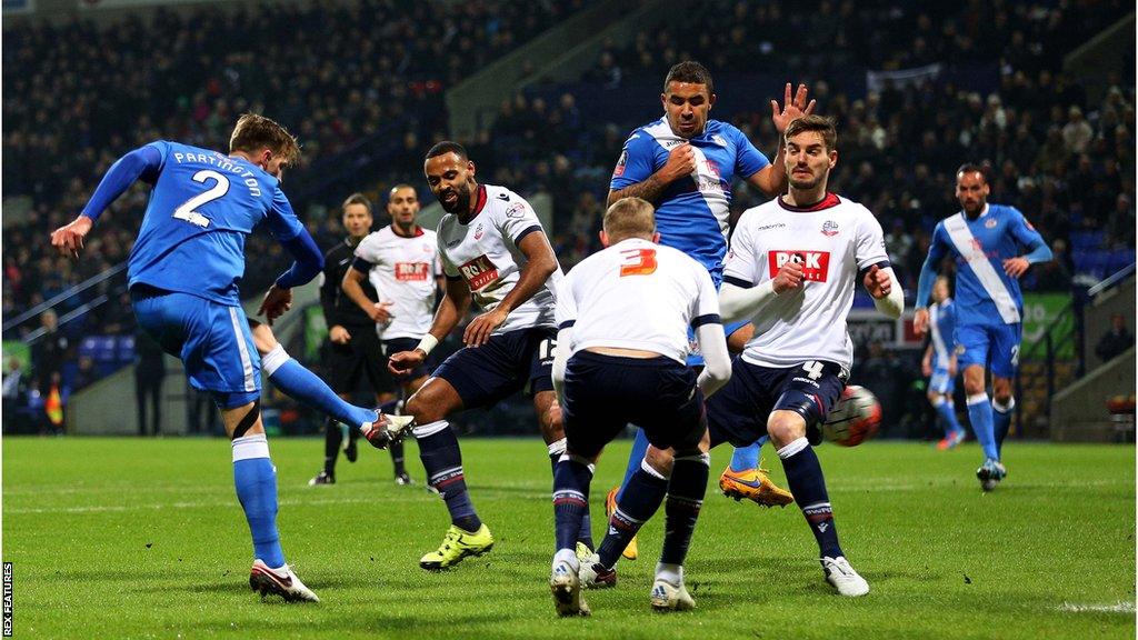 Joe Partington scores for Eastleigh at Bolton