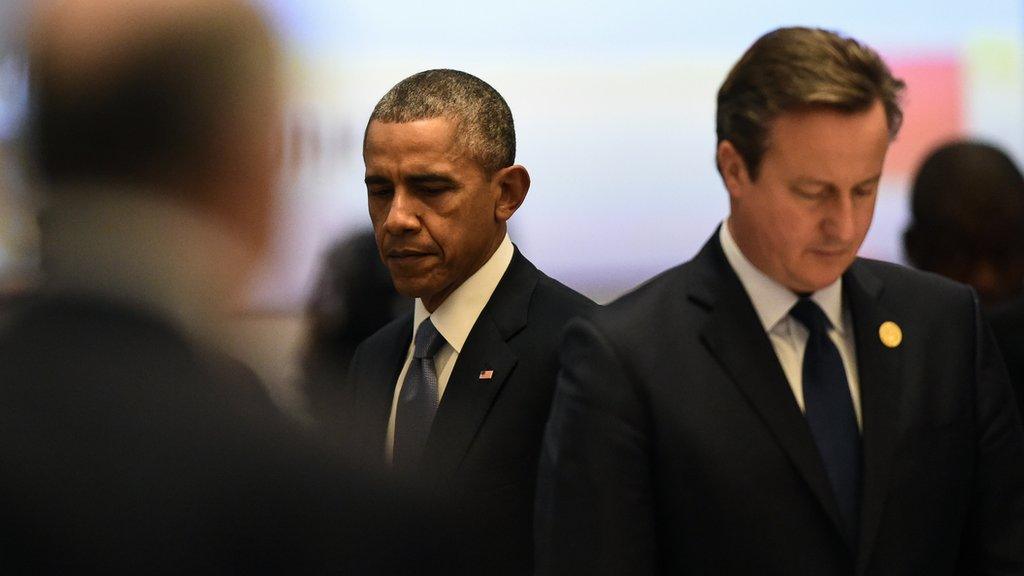 Obama and Cameron looking in opposite directions