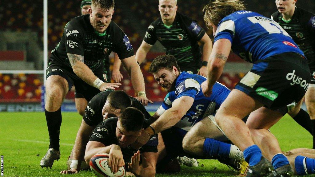 Ed Scragg scores a try for London Irish