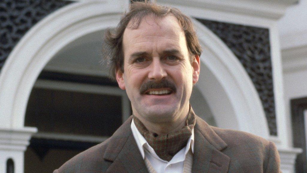 John Cleese as Basil Fawlty