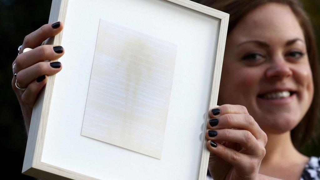 Hattie Allsop with a drawing, Reflection IV, 2016, by Antony Gormley