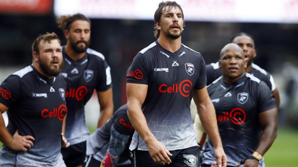 Eben Etzebeth of the Sharks prepares for action with his team-mates