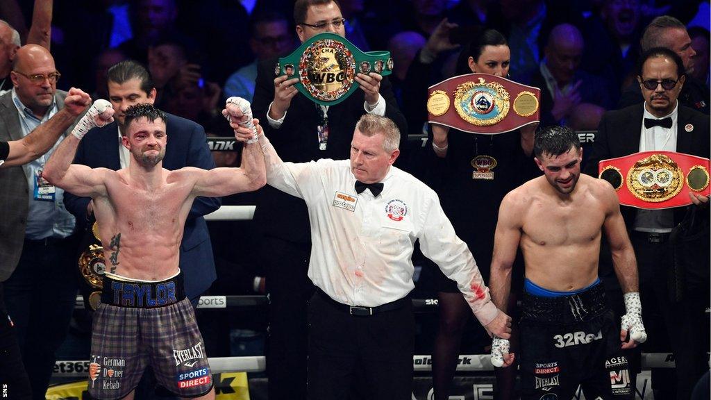 Josh Taylor's arm is held aloft after his bout with Jack Catterall