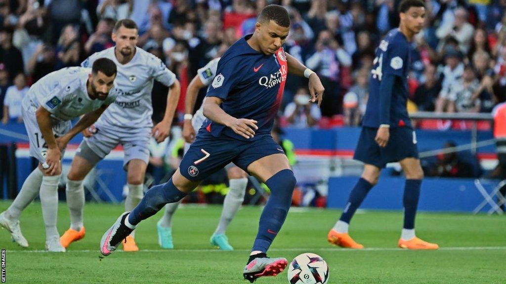 Kylian Mbappe playing for Paris St-Germain