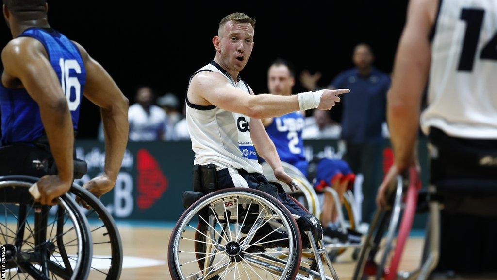 GB wheelchair basketball player Gregg Warburton points during a match