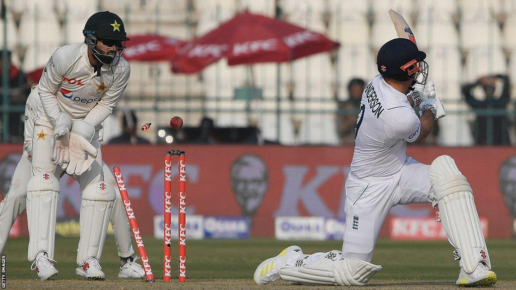 England's James Anderson is bowled