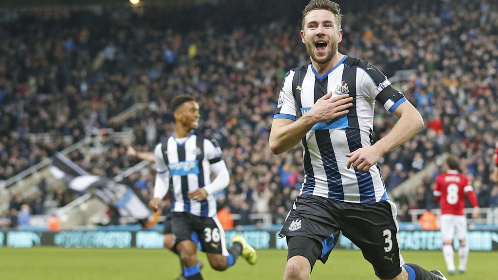 Paul Dummett celebrates