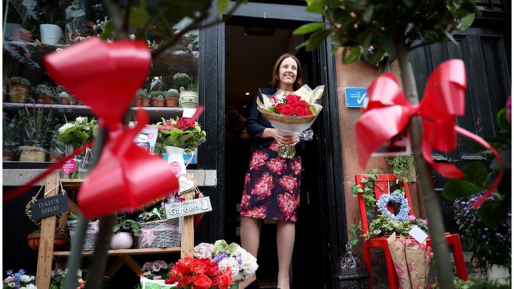 Kezia Dugdale at flower shop