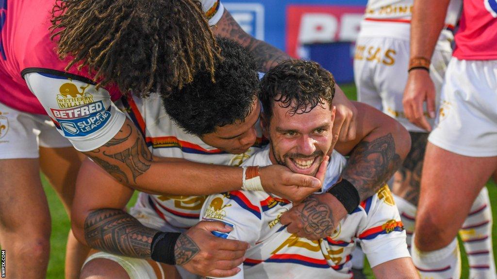 Will Dagger celebrates after his drop goal winner against Wigan