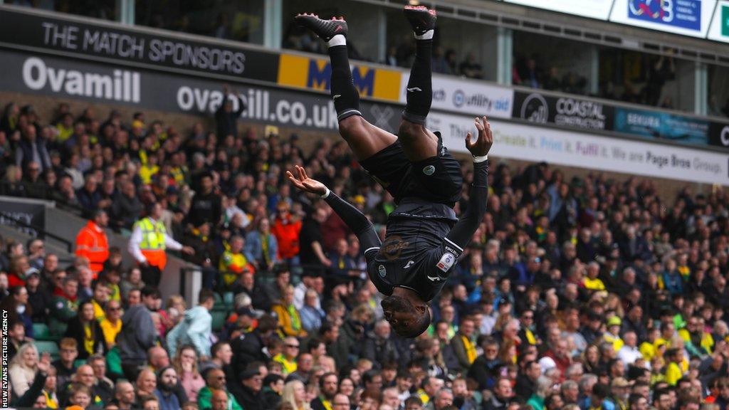 Olivier Ntcham celebrates in spectacular fashion after scoring his seventh goal of the season