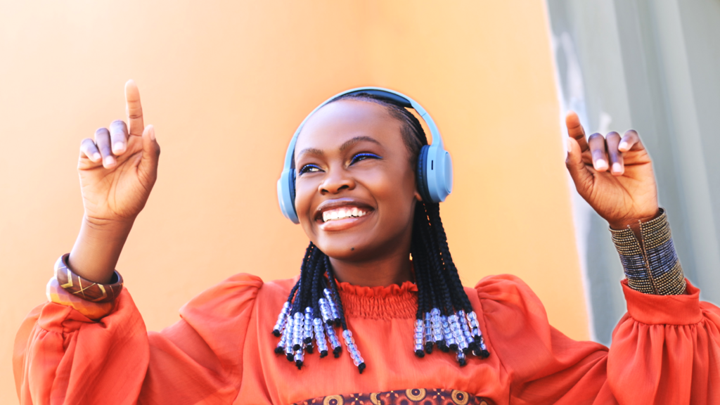 A model in South Africa listening to music on headphones