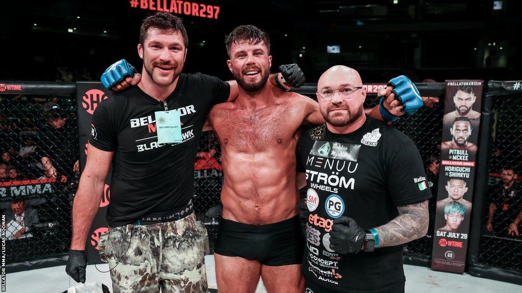 Karl Moore celebrates beating Alex Polizzi at Bellator 297 in June 2023