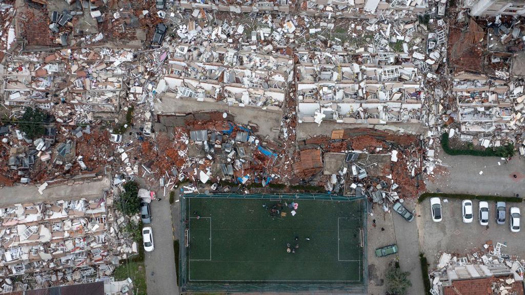 An aerial view of debris of a collapsed building in Hatay, Turkey