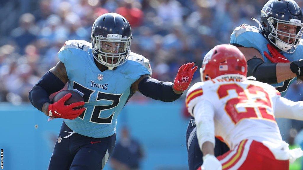 Derrick Henry playing for the Tennessee Titans