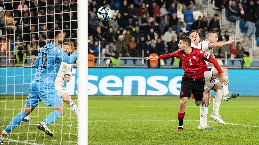 Lawrence Shankland scores for Scotland in Georgia