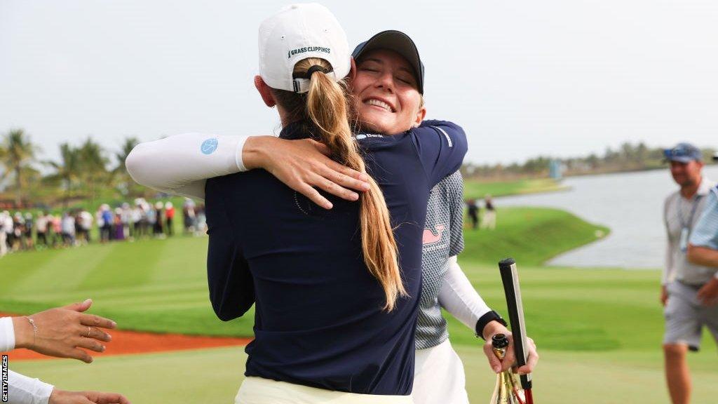 Bailey Tardy is congratulated by United States team-mate Sarah Schmelzel after winning LPGA Blue Bay