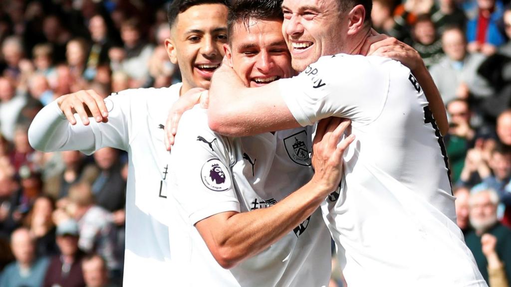 Ashley Westwood celebrates