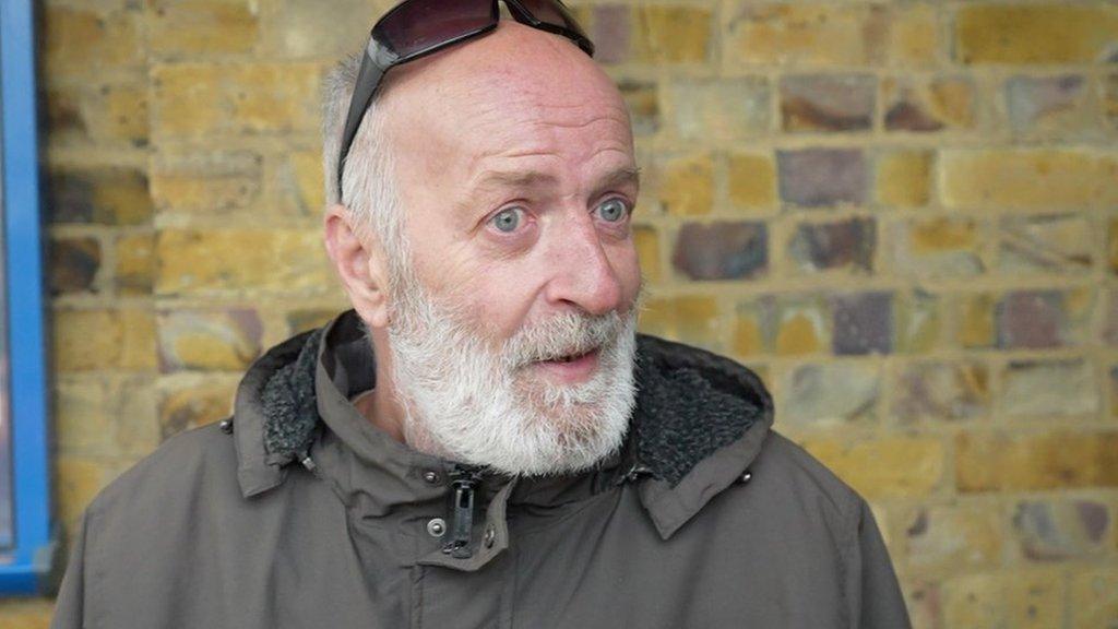 Frank Armstrong, 59, from Harlow, queuing at a food bank charity