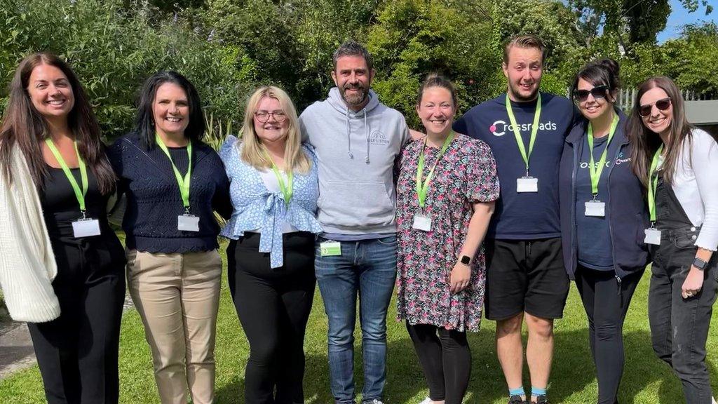 Photo of Crossroads charity workers in a garden