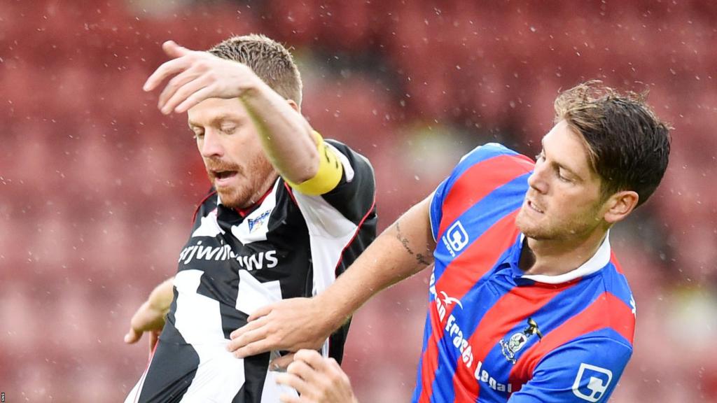 Dunfermline's Andy Geggan tangles with with Inverness scorer Iain Vigurs