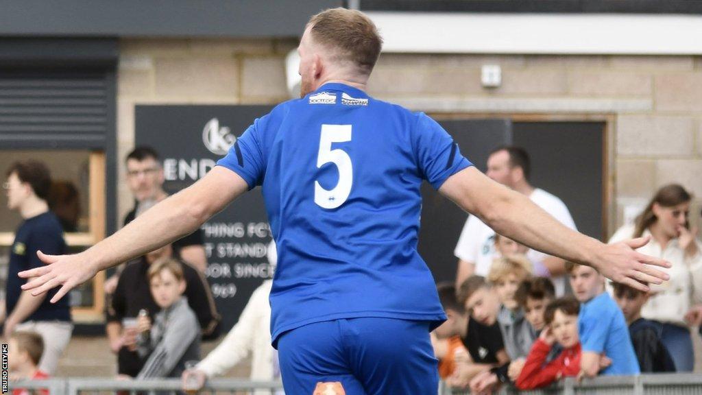 Ed Palmer celebrates scori9ng for Truro City