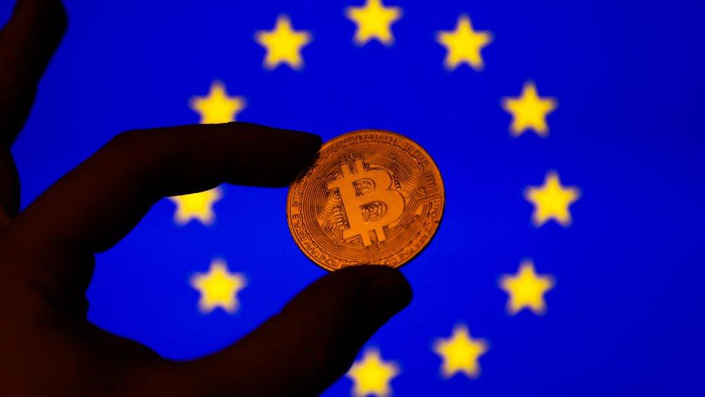 Bitcoin symbol and EU flag