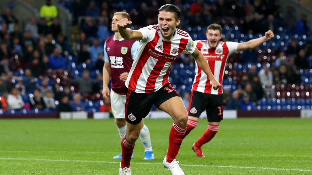 George Dobson celebrates