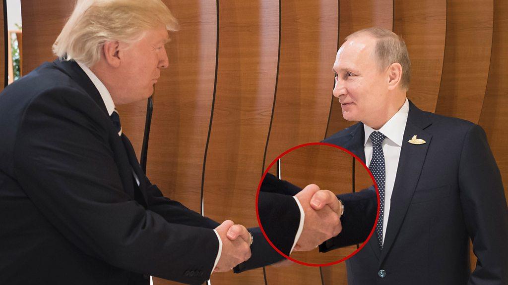 Two alpha males meet - but who had the dominant handshake and who couldn't maintain eye contact?