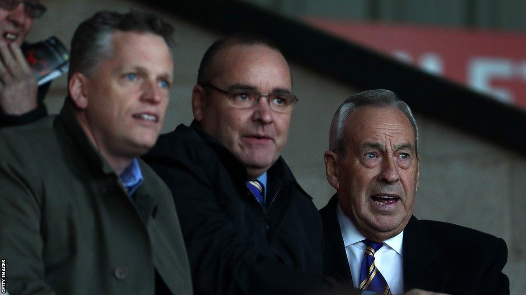 Brian Caldwell (centre) has spent the past seven years at Shrewsbury Town and saw the club reach the League One play-off final in 2018