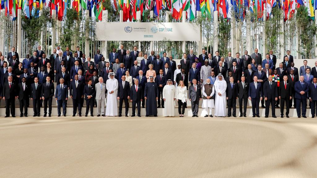 Leaders posing for a group photo at the UN Climate Change Conference COP28