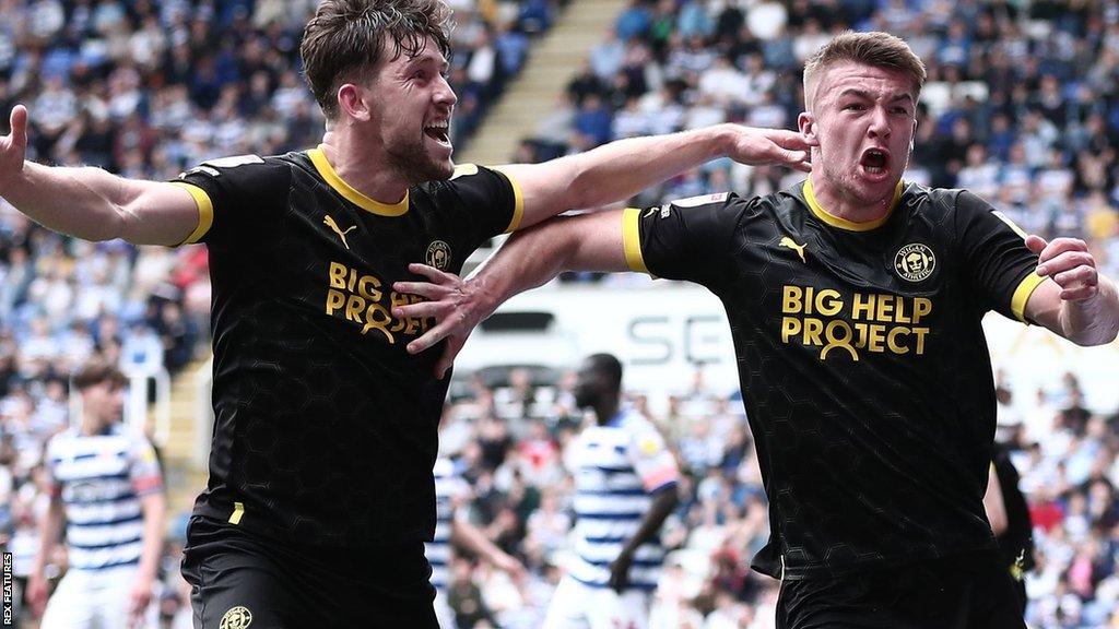 Charlie Hughes celebrates scoring for Wigan