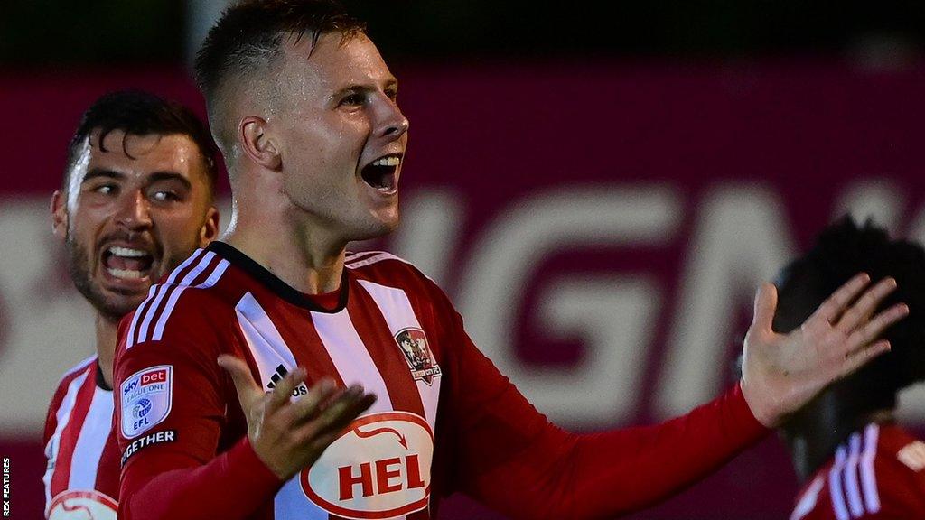 James Scott celebrates his late winner against Crawley Town in the Carabao Cup last month