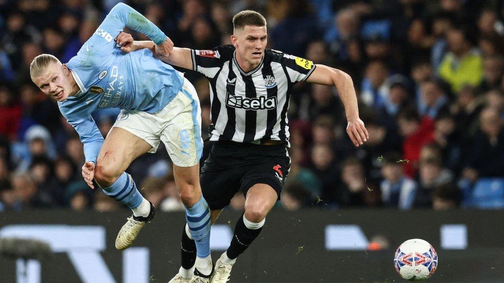 Newcastle's Sven Botman challenges Manchester City's Erling Haaland during the FA Cup tie