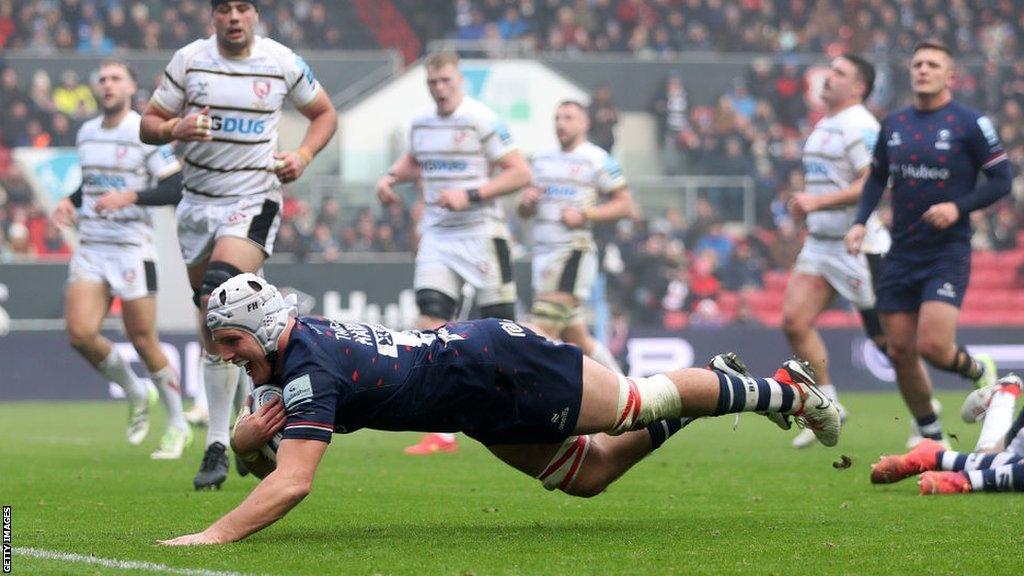 Fitz Harding dives over for a try for Bristol